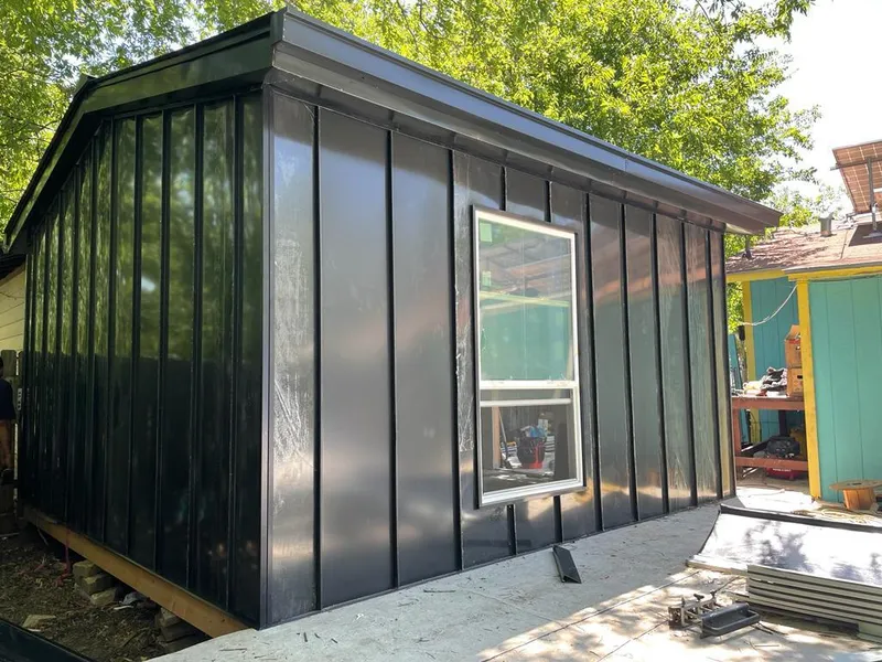 Black standing seam metal wall panels for Roof Inspection in Hawthorne